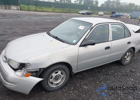 2000 Toyota Corolla Ve z USA, uszkodzony, nr VIN 2T1BR12E3YC284075
